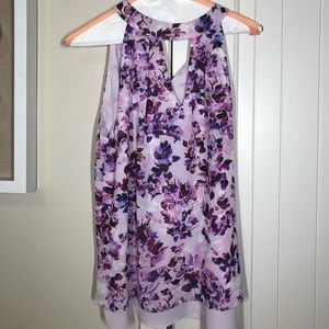 purple floral, sleeveless top w front cut out